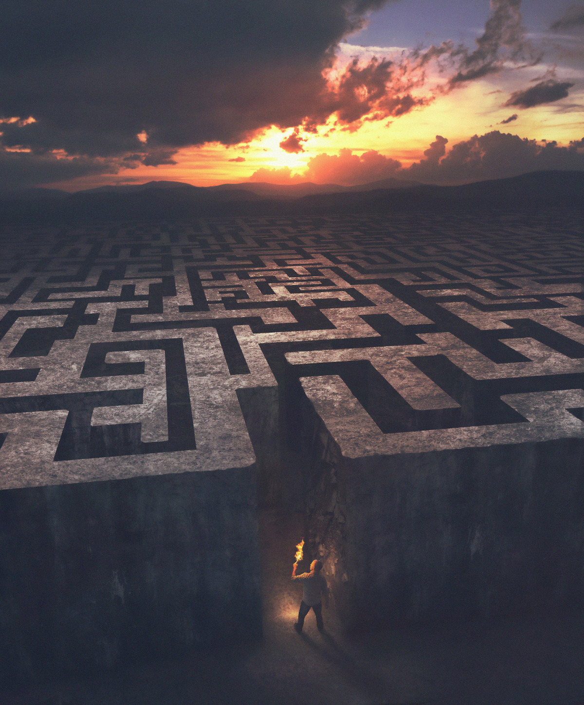 A man enters into a huge maze in the dark.